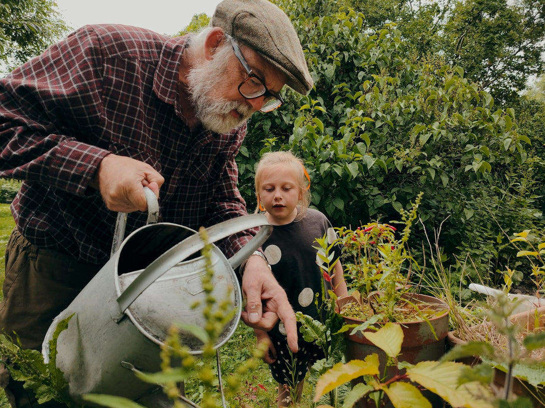 Grandparents in the garden with their grandchildren